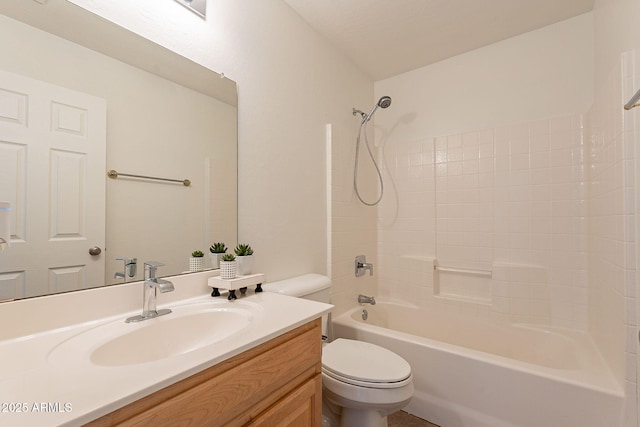 bathroom featuring toilet, vanity, and shower / bathing tub combination