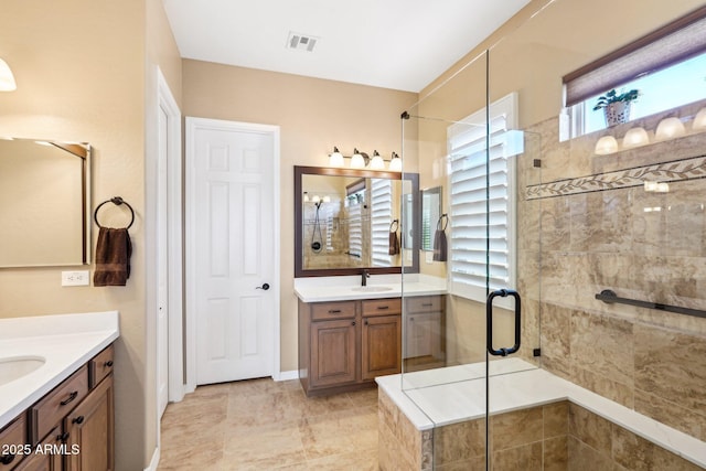 bathroom featuring vanity and walk in shower