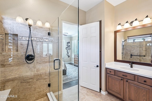 bathroom with an enclosed shower and vanity