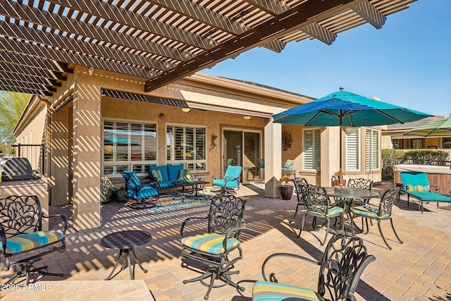 view of patio / terrace with a hot tub, an outdoor hangout area, and a pergola