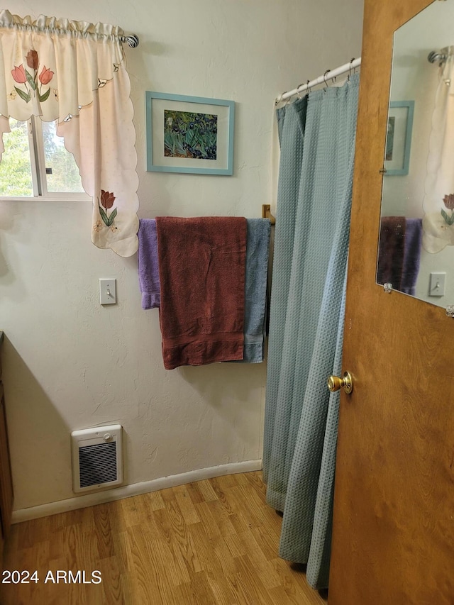 bathroom featuring hardwood / wood-style flooring