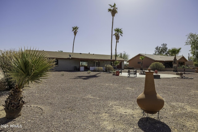 view of front of home with a patio