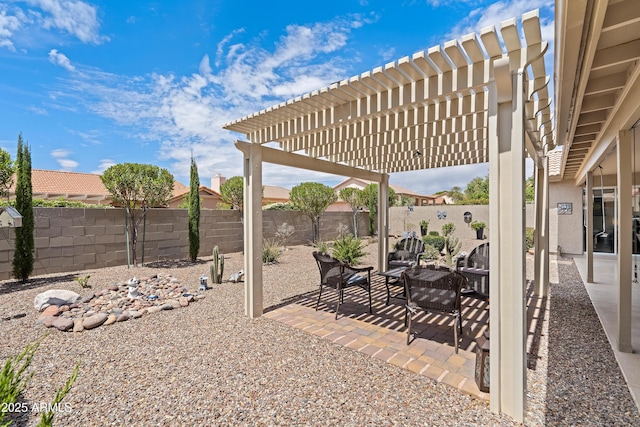 exterior space featuring a fenced backyard, a pergola, a patio, and outdoor lounge area