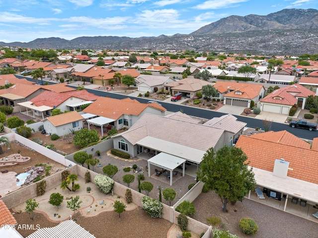 aerial view with a mountain view and a residential view