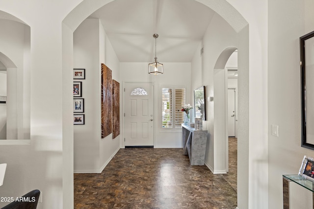 entryway featuring baseboards