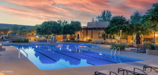 community pool with a patio