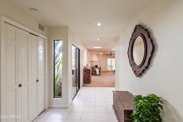 entrance foyer with light carpet