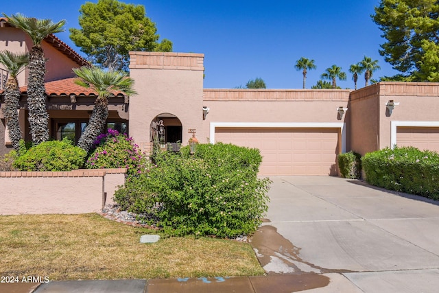 view of front of property with a garage