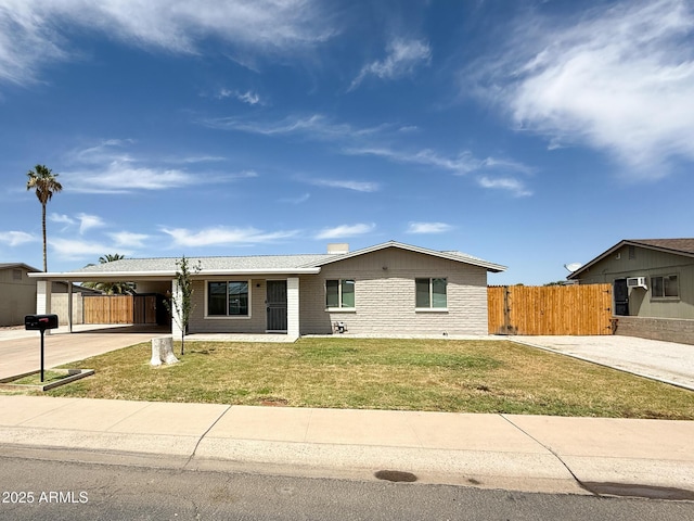 12230 N 47th Dr, Glendale, AZ 85304 - ranch-style home with driveway, a carport, and brick siding