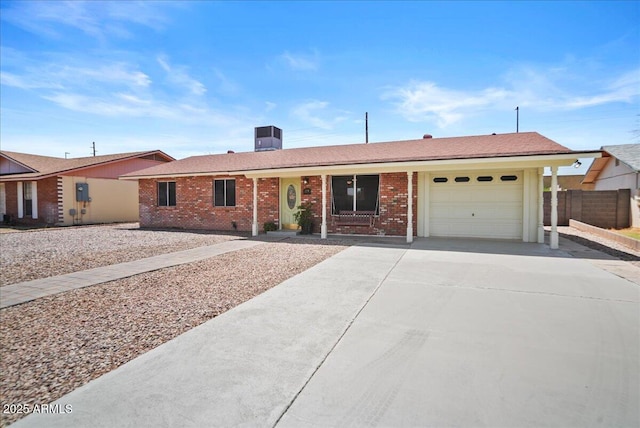 724 N Pine St, Gilbert, AZ 85233 - ranch-style house with a garage, concrete driveway, brick siding, and fence