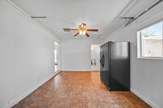 724 N Pine St, Gilbert, AZ 85233 - kitchen with black fridge, ceiling fan, ornamental molding, baseboards, and light tile patterned flooring