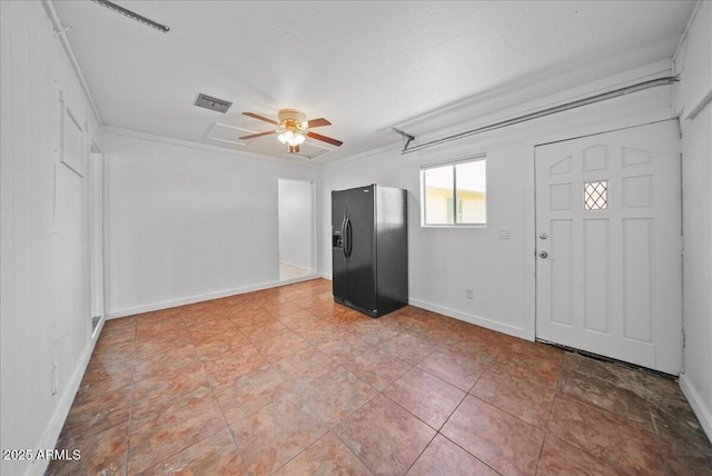 724 N Pine St, Gilbert, AZ 85233 - foyer entrance with ceiling fan and baseboards