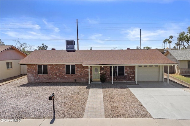 724 N Pine St, Gilbert, AZ 85233 - ranch-style home with brick siding, a garage, concrete driveway, and a shingled roof