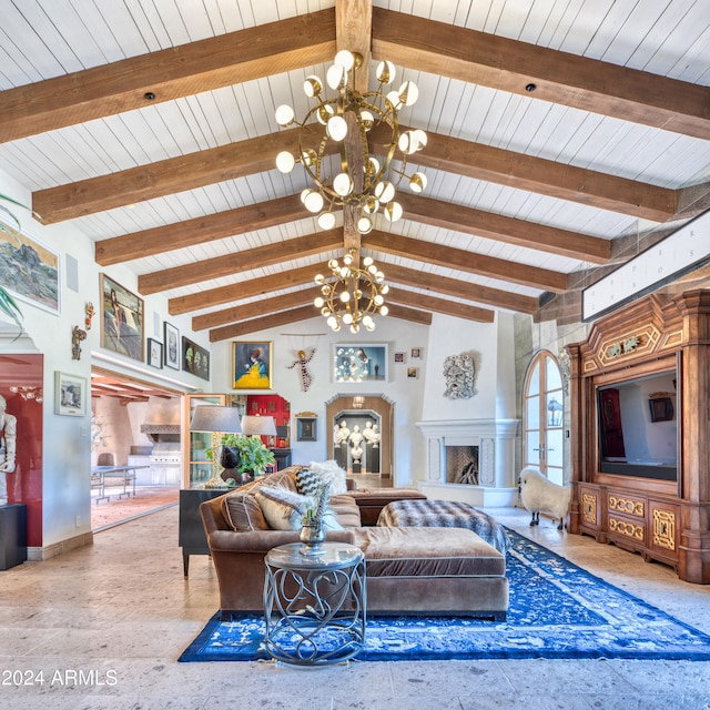 living room featuring a fireplace with raised hearth, lofted ceiling with beams, an inviting chandelier, baseboards, and wood ceiling