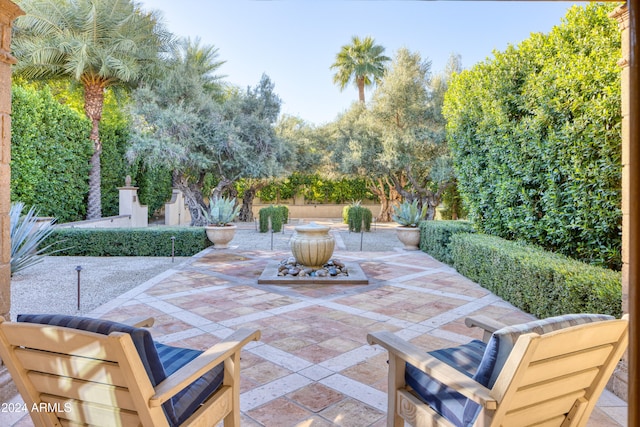 view of patio featuring fence