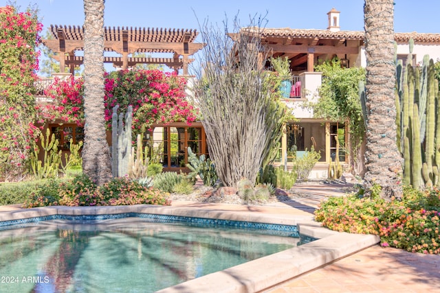 view of pool featuring a pergola