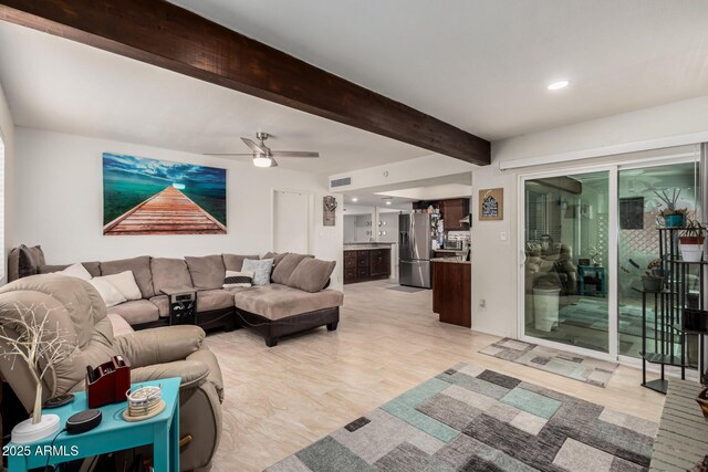 living room featuring beam ceiling, recessed lighting, a ceiling fan, and visible vents