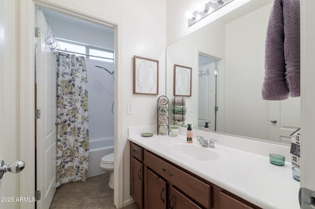 bathroom with toilet, shower / tub combo, and vanity