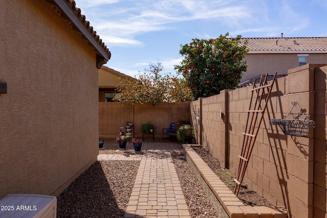 view of patio with a fenced backyard