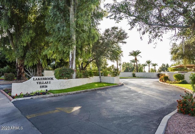 11026 N 28th Dr Unit 34, Phoenix, AZ 85029 - view of asphalt road featuring curbs