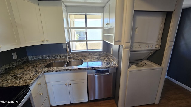 11026 N 28th Dr Unit 34, Phoenix, AZ 85029 - kitchen with a sink, stacked washer / drying machine, stainless steel dishwasher, white cabinetry, and dark wood-style flooring