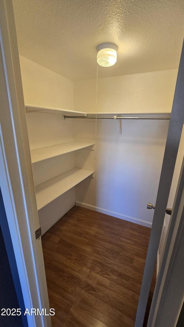 11026 N 28th Dr Unit 34, Phoenix, AZ 85029 - spacious closet featuring wood finished floors