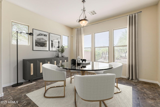 30374 N 124th Dr, Peoria, AZ 85383 - dining room featuring stone tile floors and baseboards