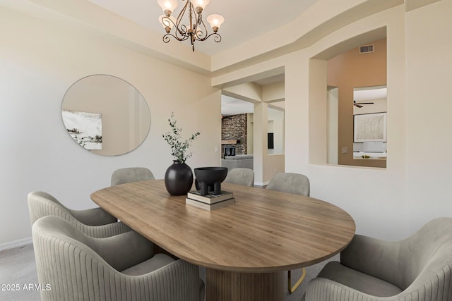 30374 N 124th Dr, Peoria, AZ 85383 - dining room featuring a chandelier, carpet flooring, and baseboards