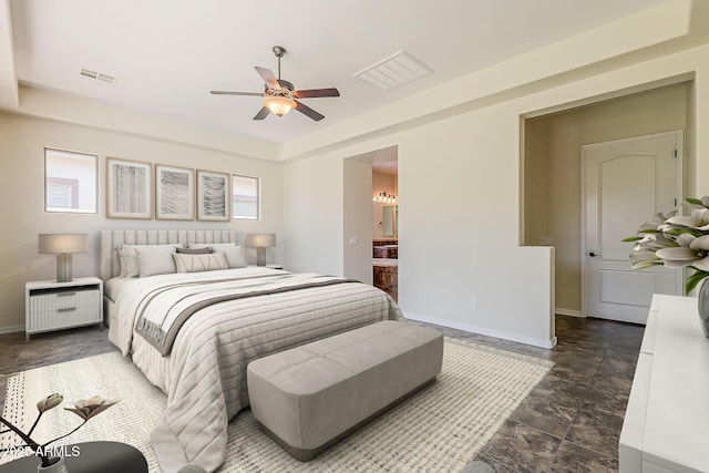 30374 N 124th Dr, Peoria, AZ 85383 - bedroom featuring baseboards, a raised ceiling, stone finish flooring, ensuite bathroom, and ceiling fan