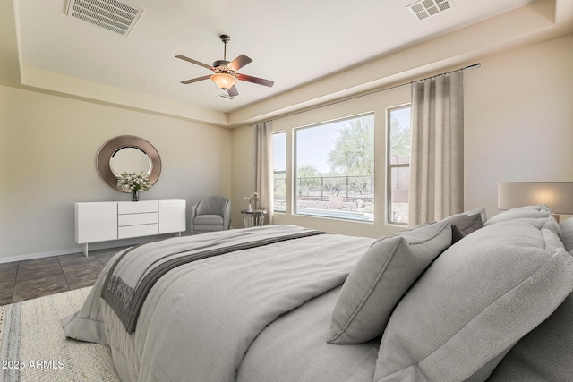 30374 N 124th Dr, Peoria, AZ 85383 - bedroom featuring baseboards, a ceiling fan, and a raised ceiling
