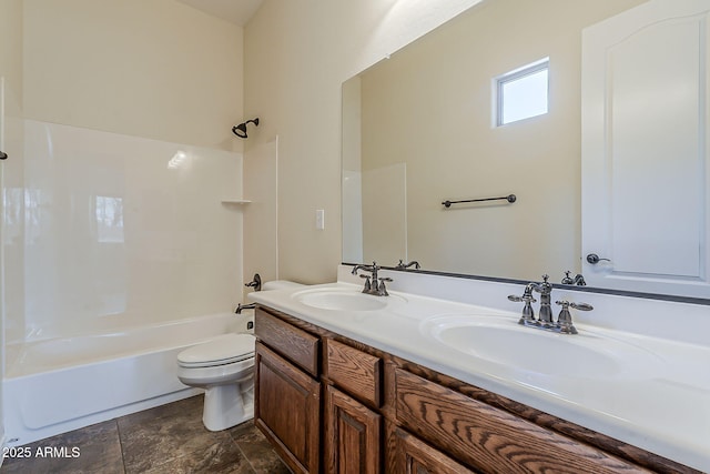 30374 N 124th Dr, Peoria, AZ 85383 - full bathroom featuring shower / bathtub combination, double vanity, toilet, and stone finish floors