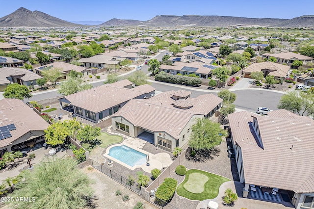 30374 N 124th Dr, Peoria, AZ 85383 - aerial view of residential area featuring a pool area and a mountainous background