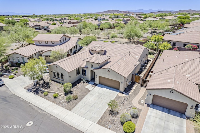 30374 N 124th Dr, Peoria, AZ 85383 - aerial perspective of suburban area featuring a mountainous background