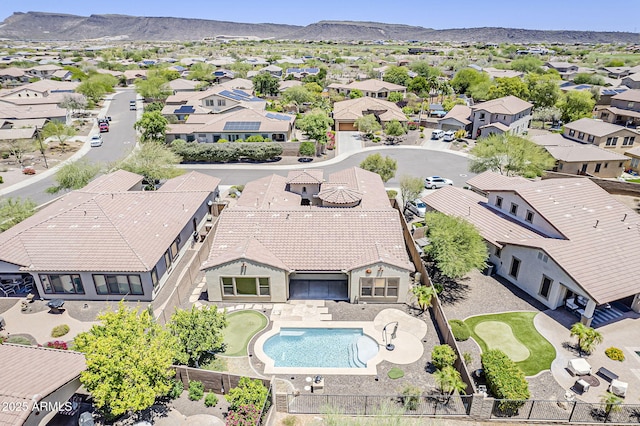 30374 N 124th Dr, Peoria, AZ 85383 - aerial view of residential area featuring a mountain backdrop and a pool area