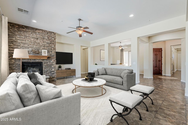 30374 N 124th Dr, Peoria, AZ 85383 - living room featuring ceiling fan, recessed lighting, a fireplace, and baseboards