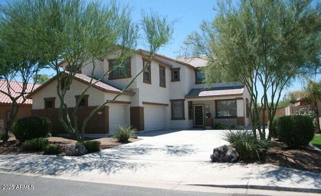 view of front of property featuring a garage