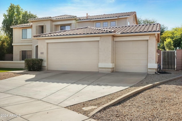 view of front of property with a garage