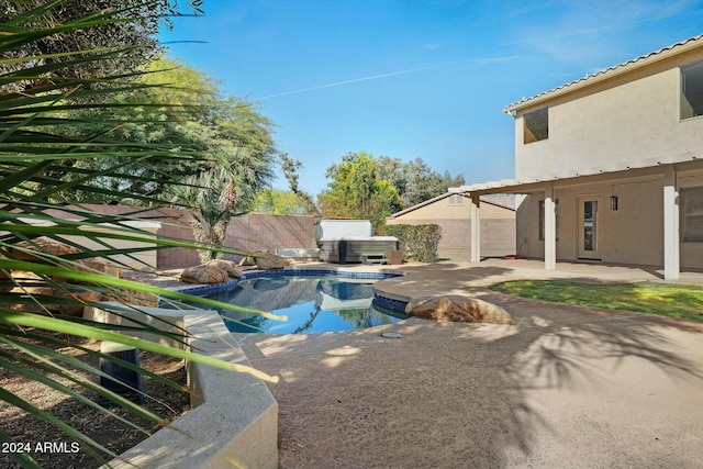 view of pool featuring a patio area