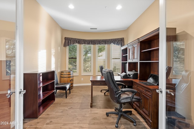 office space featuring light hardwood / wood-style floors