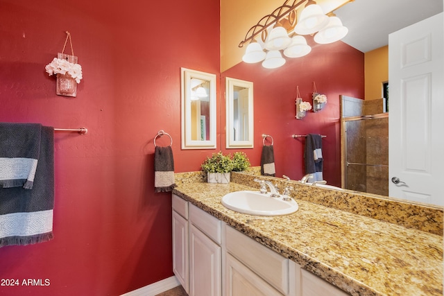 bathroom with vanity and an enclosed shower