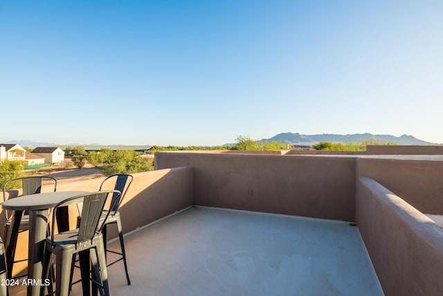 balcony featuring a mountain view