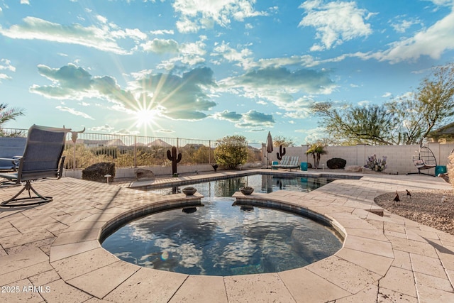 view of swimming pool with a patio area