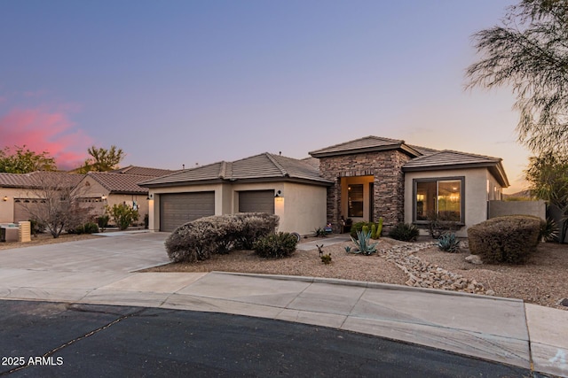 view of front of property with a garage