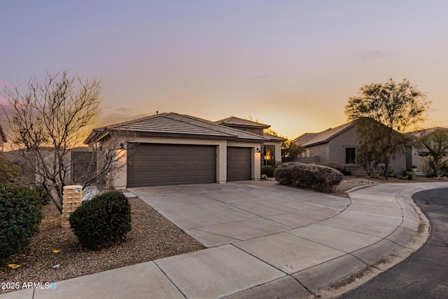 prairie-style home with a garage