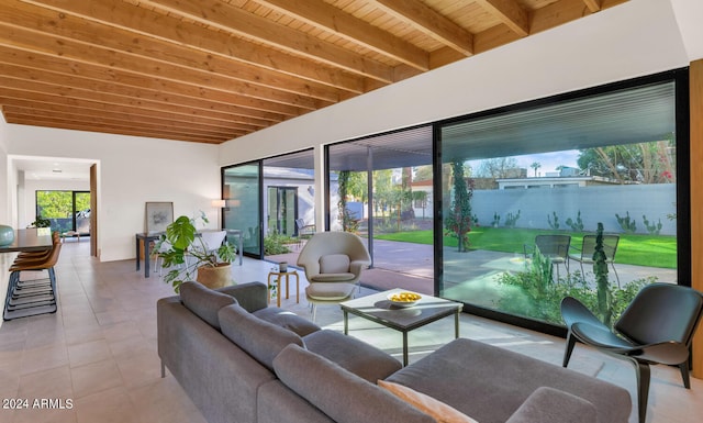 tiled living room featuring beamed ceiling and wooden ceiling