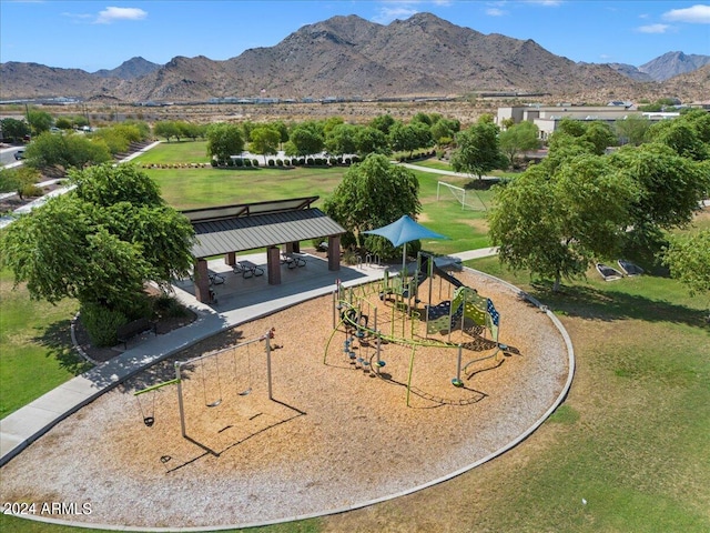 view of property's community featuring a mountain view and a playground