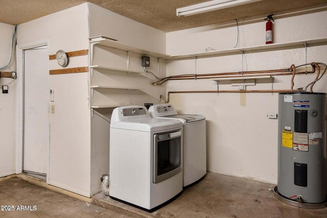 clothes washing area featuring water heater and separate washer and dryer