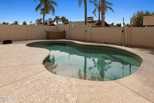 view of swimming pool featuring cooling unit