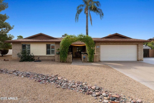 ranch-style house featuring a garage