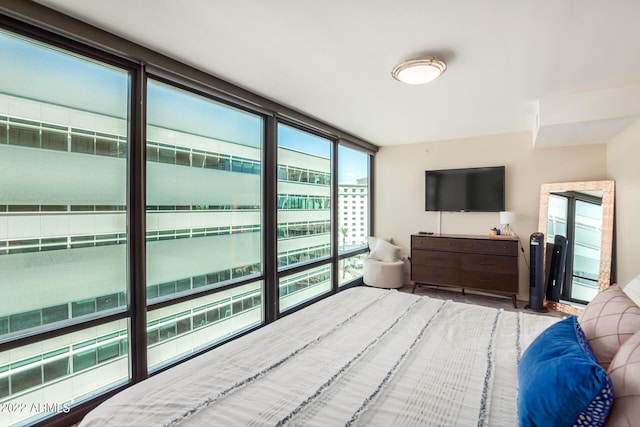 bedroom with a wall of windows